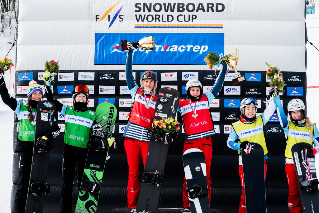 FIS Snowboard World Cup - Moscow RUS - Team SBX - Women's podium with 2nd Canada 3(BERGERMANN Zoe and CRITCHLOW Tess) in Green, 1st France 1(MOENNE LOCCOZ Nelly and TRESPEUCH Chloe) in Red and 3rd Switzerland 2(CASANOVA Lara and MEILER Simona) in Yellow © Miha Matavz/FIS