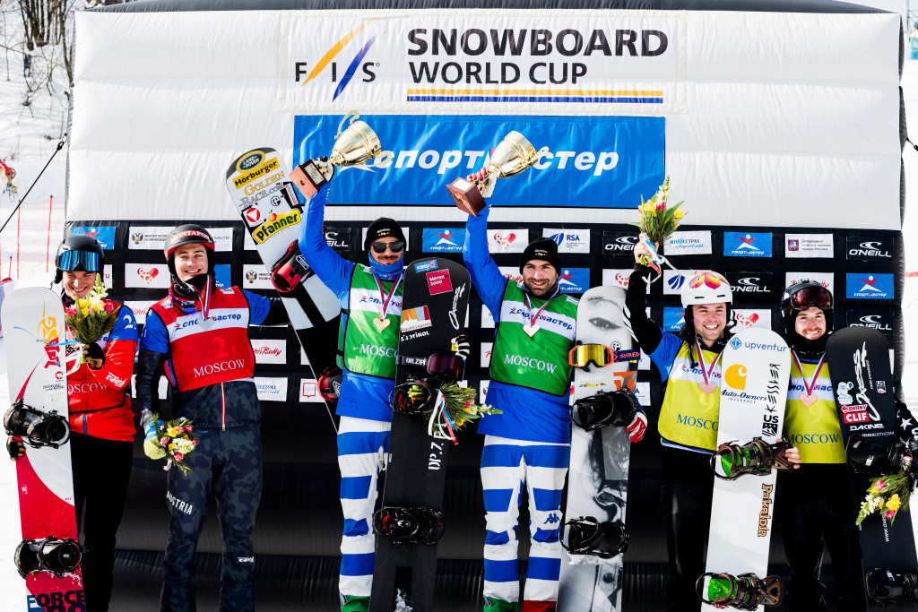 FIS Snowboard World Cup - Moscow RUS - Team SBX - Men's podium with 2nd Austria 4(HAEMMERLE A. and LUEFTNER Julian) in Red, 1st Italy 1(PERATHONER Emanuel and VISINTIN Omar) in Green and 3rd United States 6(LEITH Senna and VEDDER Jake) in Yellow © Miha Matavz/FIS